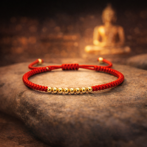 Bracelet rouge signification : pourquoi le porter ?