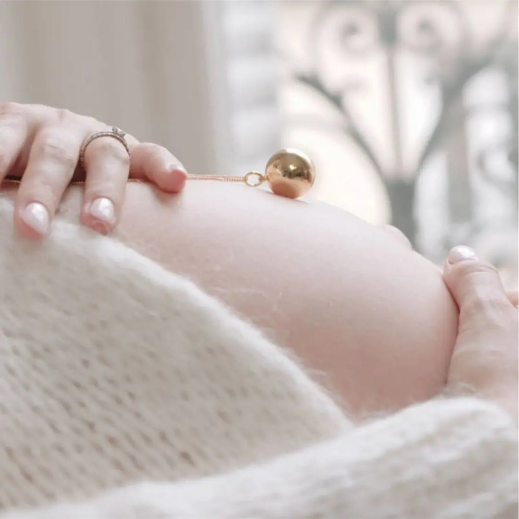 Bola de grossesse : un bijou plein de sens pour la maman