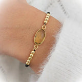 Bracelet citrine nylon noir et doré ajustable / 1 papier d'encens = 1 purification