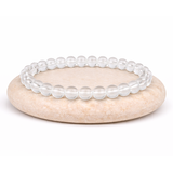 Bracelet cristal de roche avec perles rondes naturelles, symbole d'équilibre, d'énergie et d'amplification des vertus lithothérapeutiques