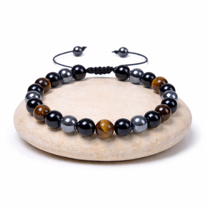 Bracelet triple protection avec perles d'hématite, d'œil de tigre et d'obsidienne noire en pierres naturelles, conçu pour éloigner les énergies négatives et favoriser le bien-être