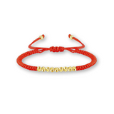 Bracelet tibétain orné de cuivre, symbole de chance et de protection, présenté avec pochette cadeau et provenance du Tibet