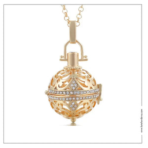 Bola de grossesse strass doré