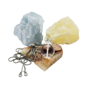collier pendentif boule cristal de roche